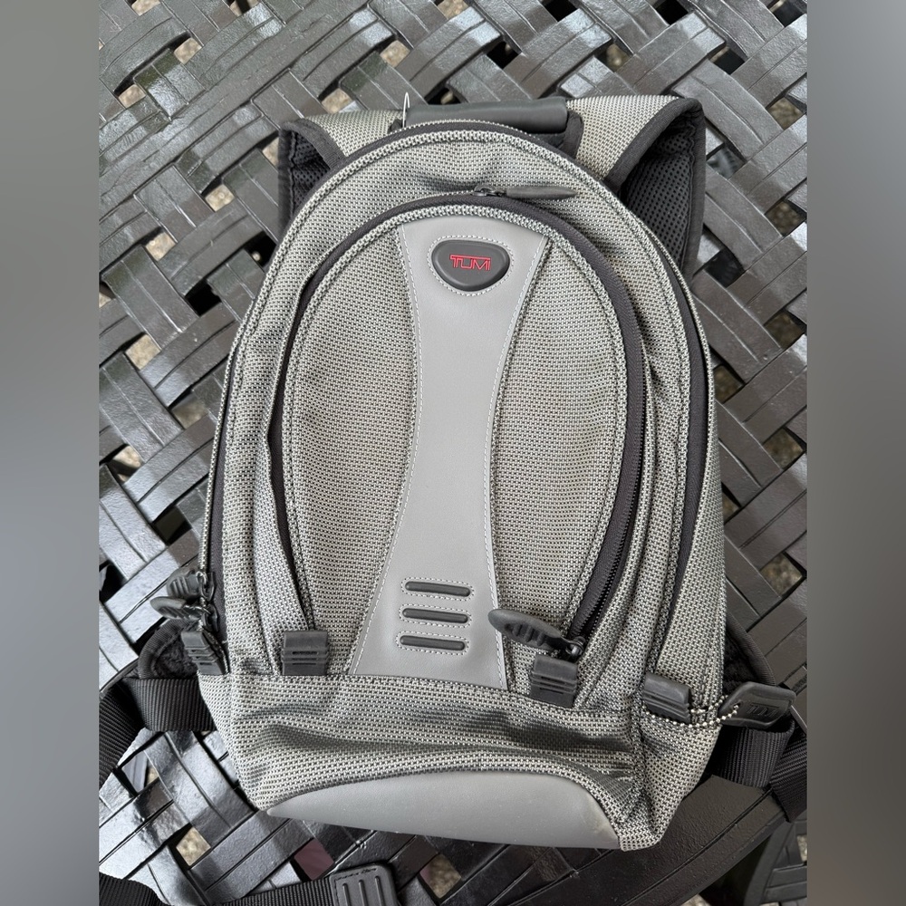 Small Tumi Ballastic Leather and nylon backpack